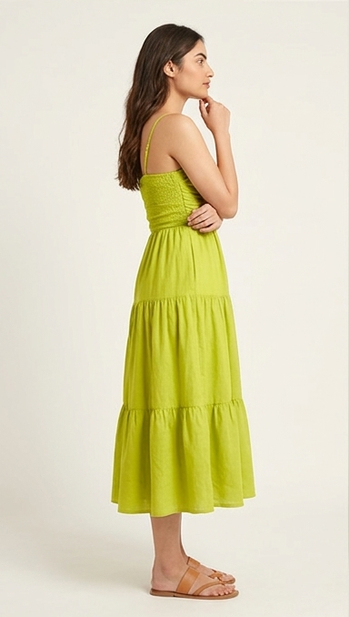 Woman wearing a green dress on a white background