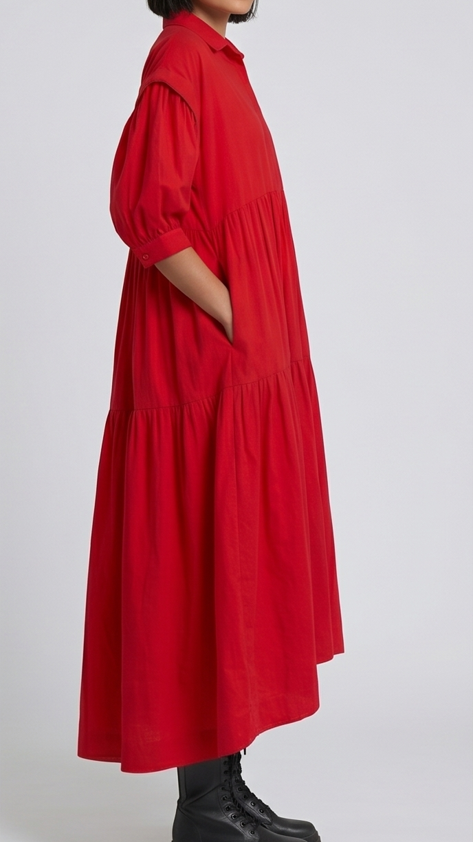Woman wearing a red dress on a white background