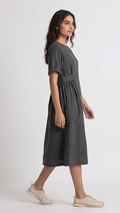 Woman wearing a gray dress